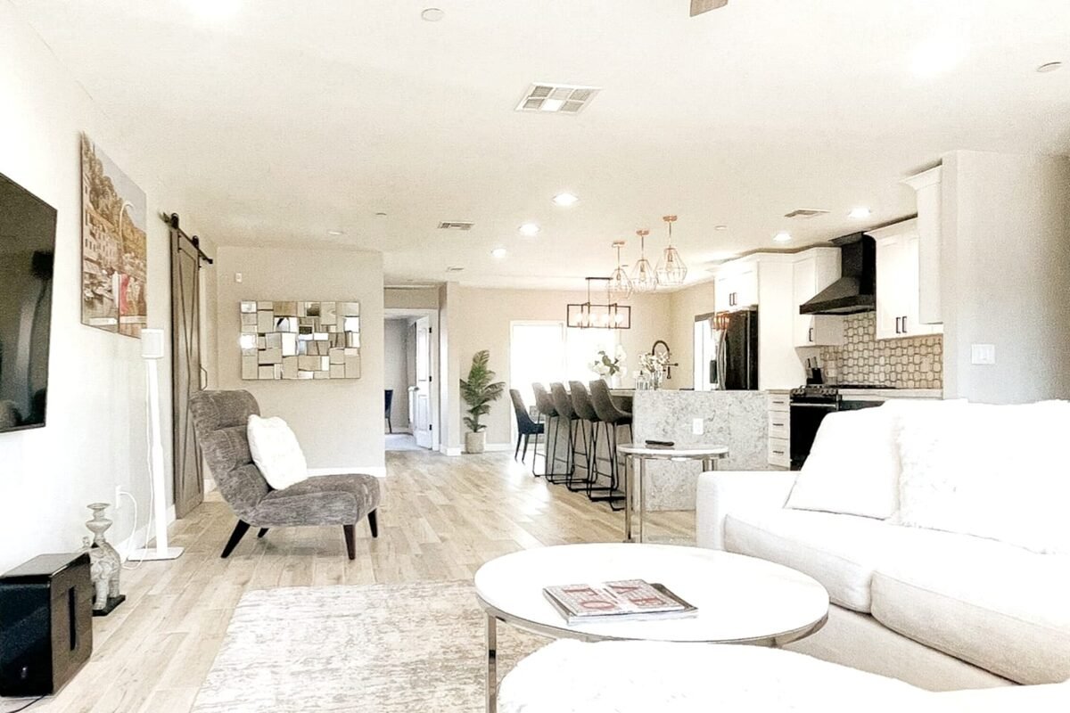 Open-plan living room and kitchen at Columbus House